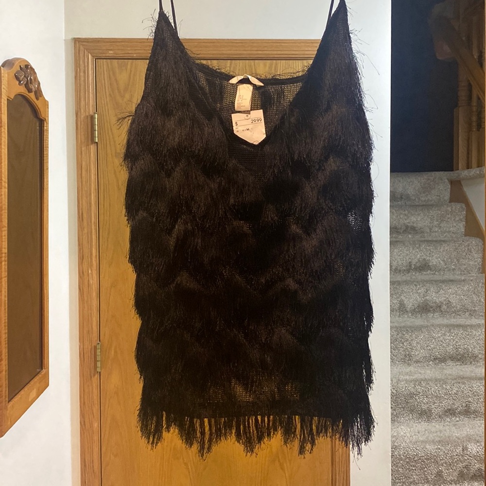 Black fringe tank top, bust is double lined, rest of top is see through